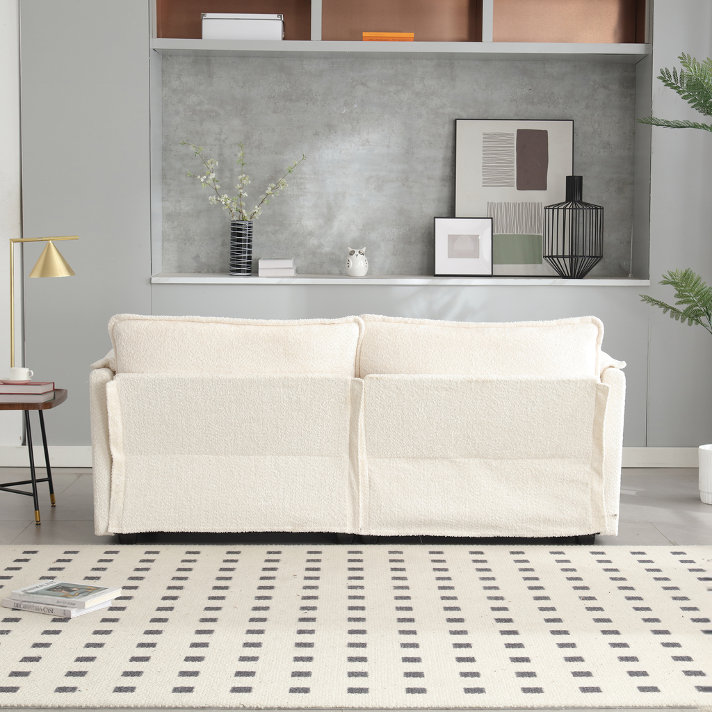 Cream boucle sofa with plush cushions in a modern living room
