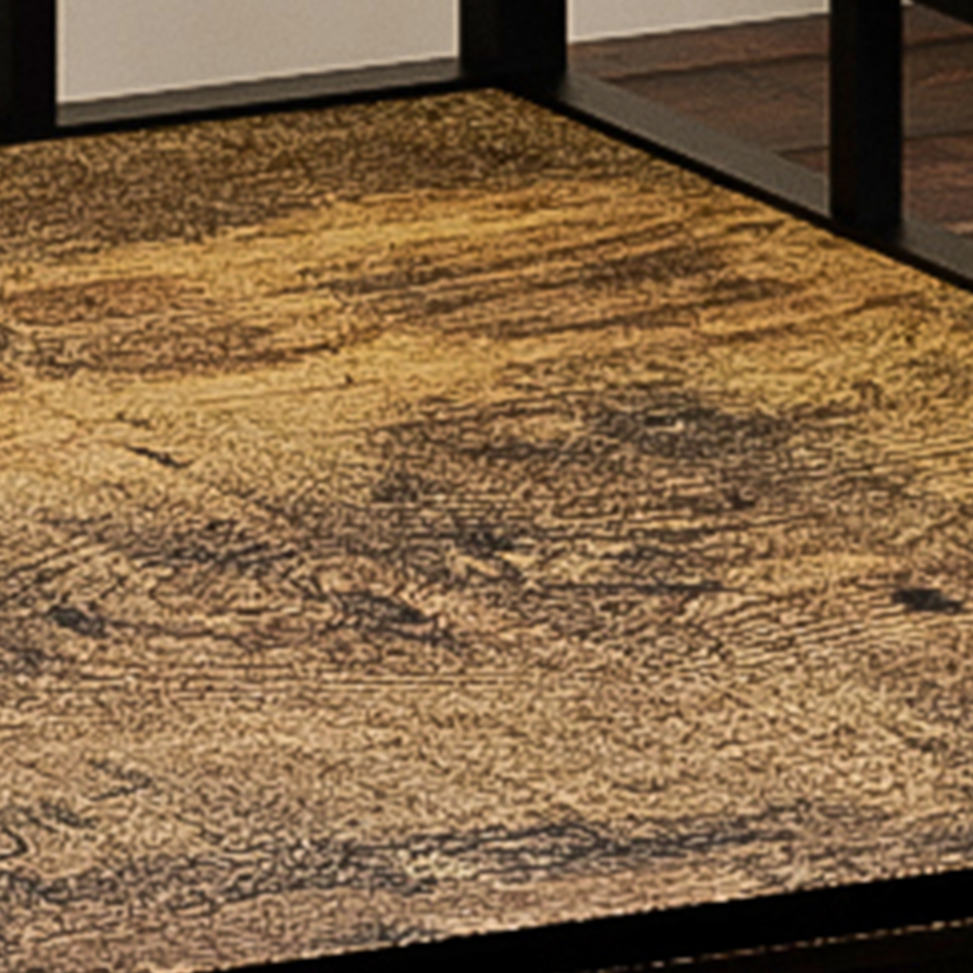 Closeup of a rustic wood grain pattern showing dark brown and golden tones