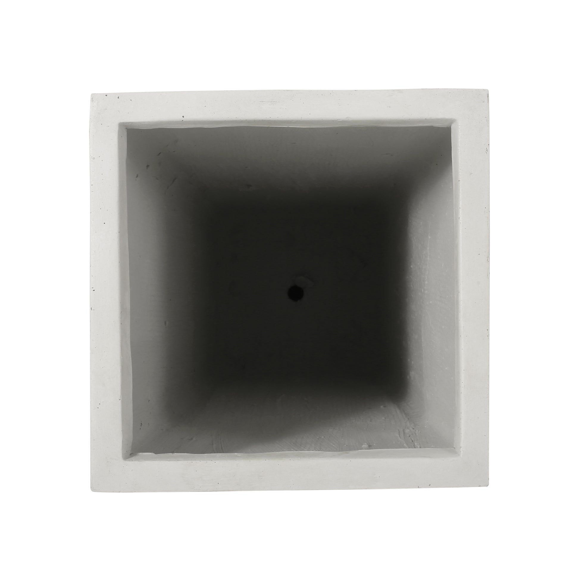 White concrete square planter with drainage hole