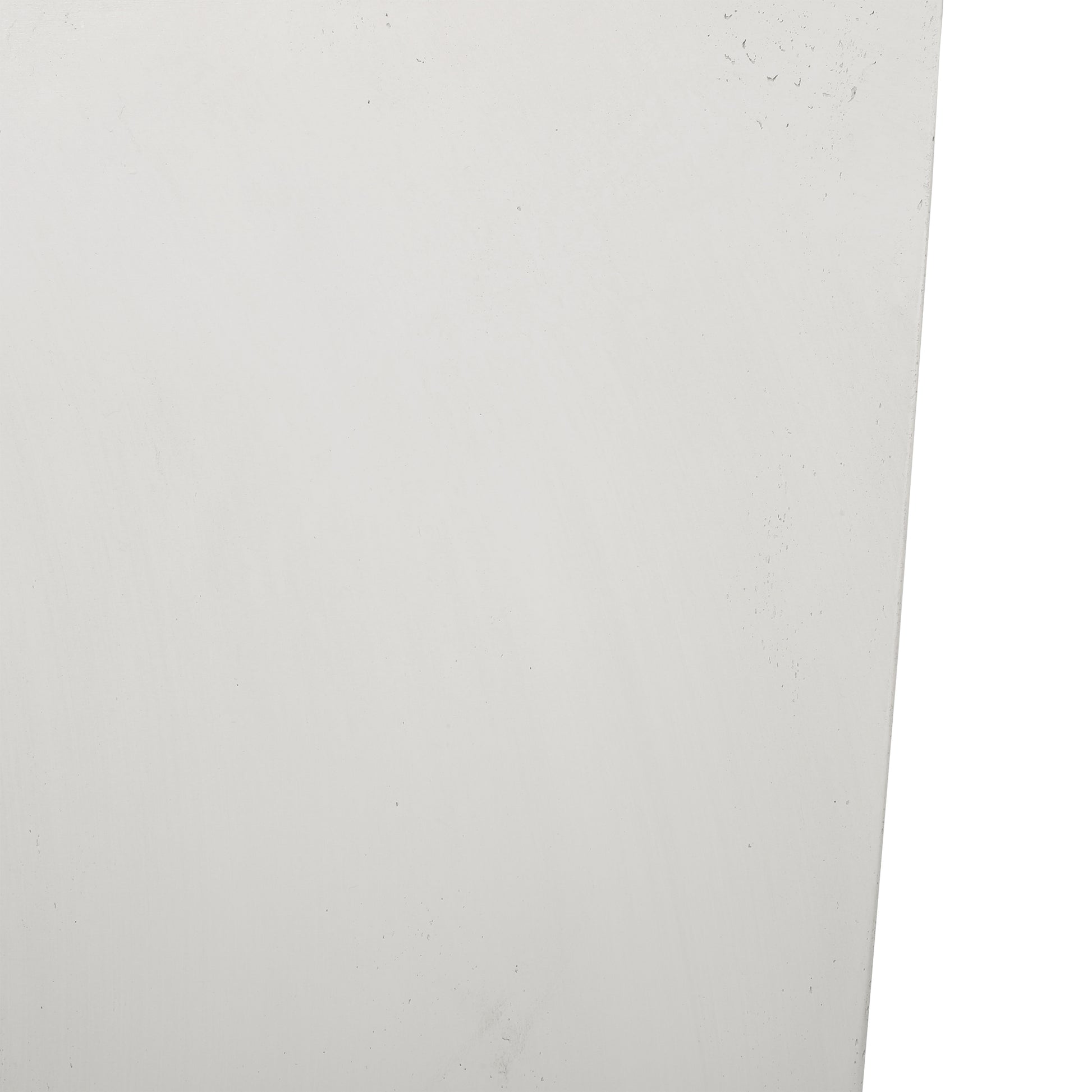 Abstract closeup of a textured matte white wall panel for interior design showing subtle imperfections