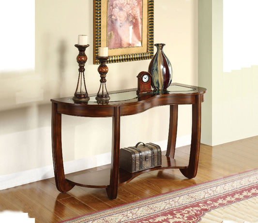 Dark wood console table with glass top and decorative chest on lower shelf