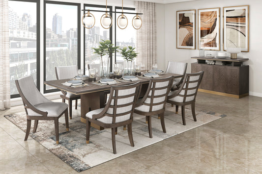 Modern dining room set featuring a dark wood table and upholstered chairs on a geometric rug