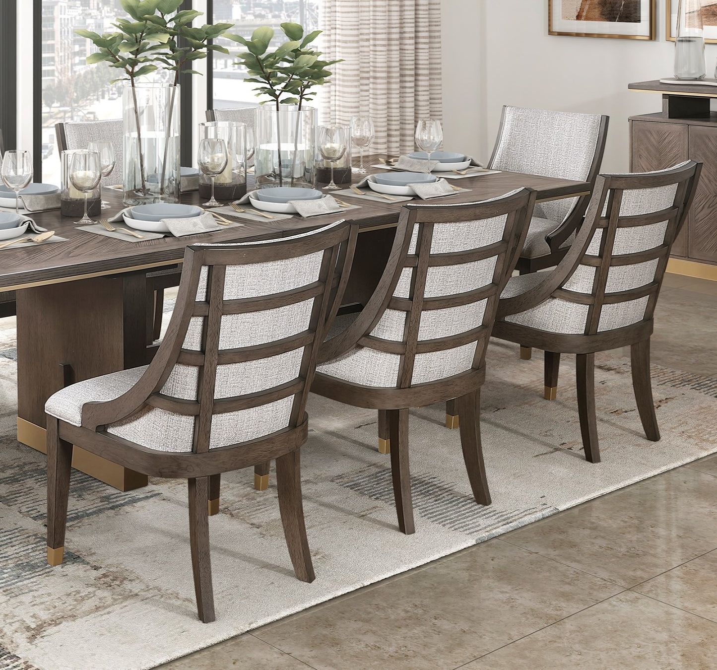 Modern dining chairs with carved wood frames and upholstered seats perfect for a stylish dining room set
