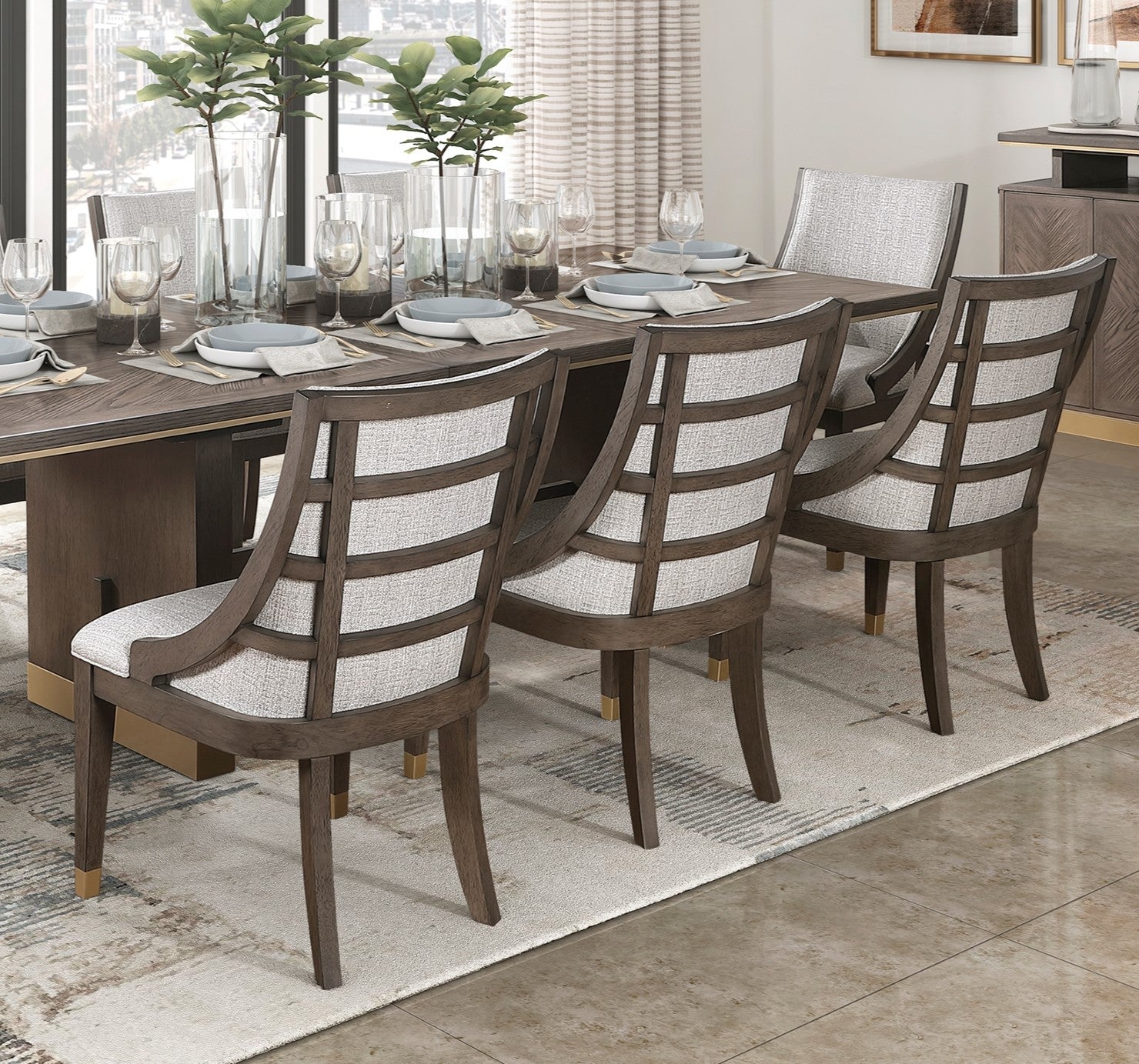 Modern dining chairs with carved wood frames and upholstered seats perfect for a stylish dining room set