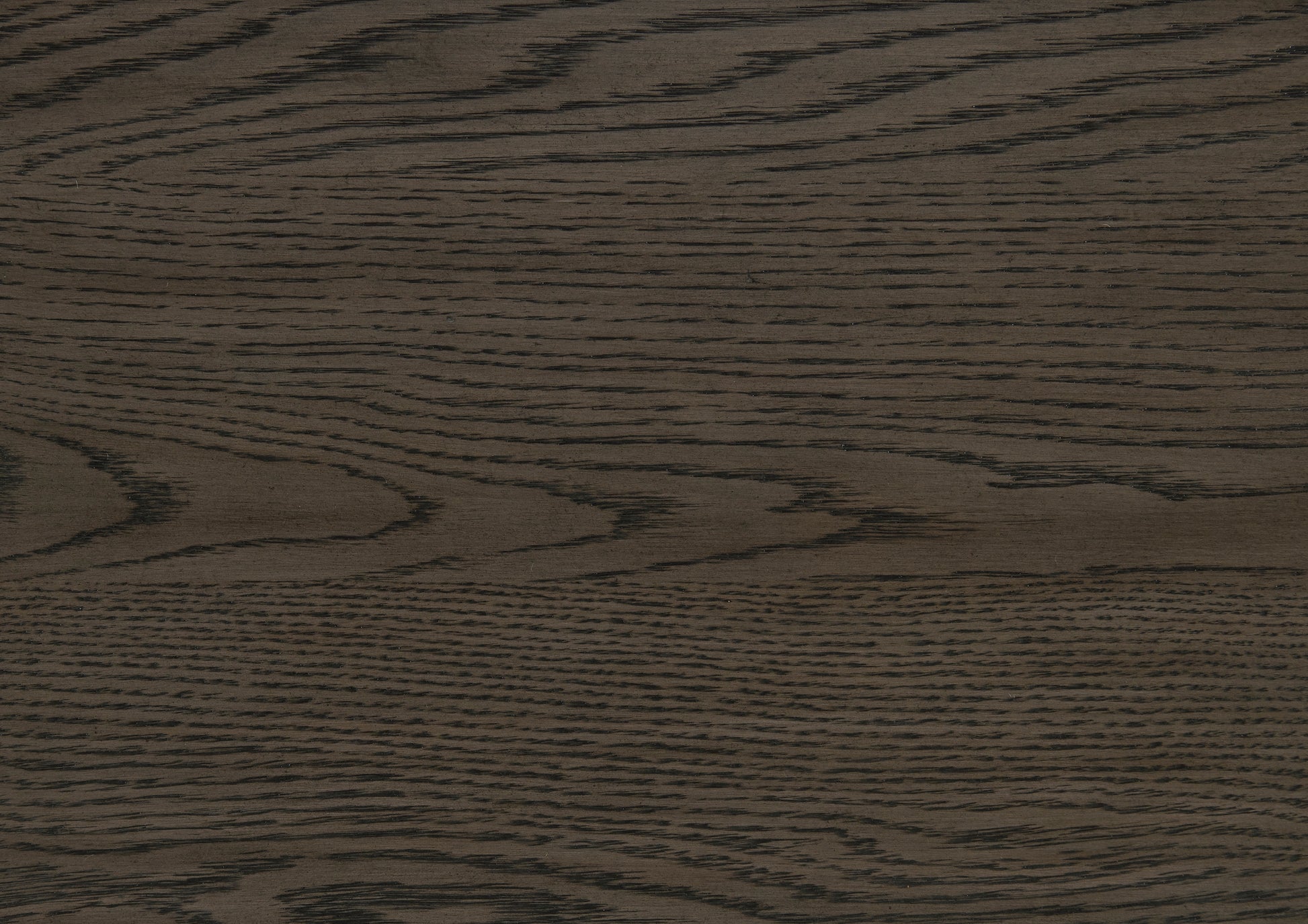 Dark stained oak wood veneer with prominent grain for furniture