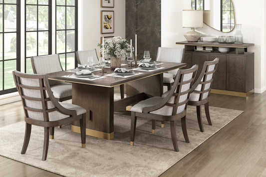 Dark wood dining table with upholstered chairs and gold accents