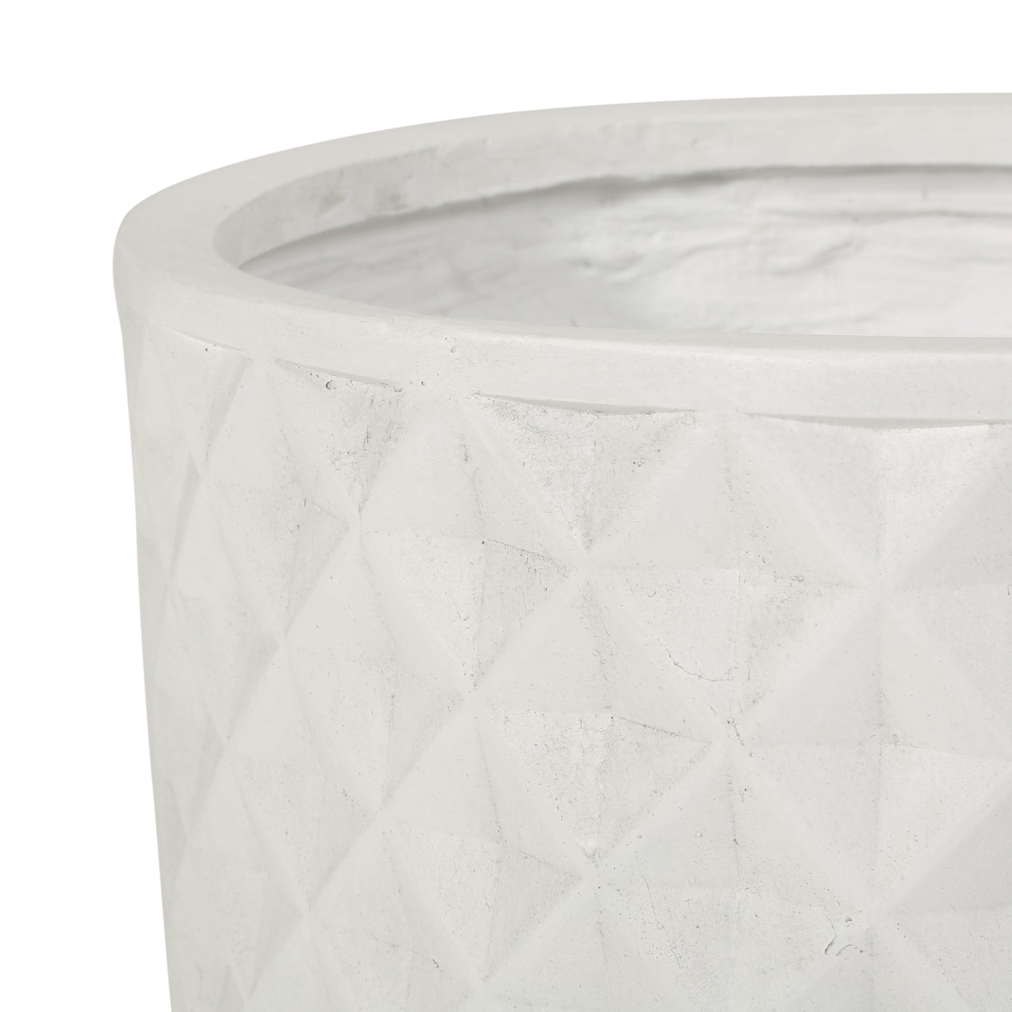 Textured white ceramic planter with a diamond pattern ideal for indoor plants