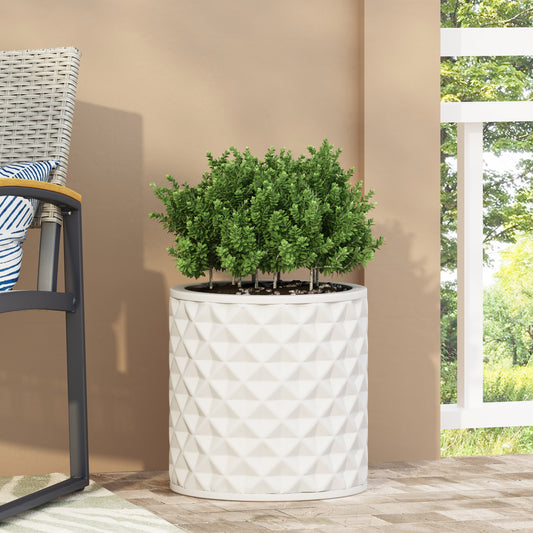 White ceramic planter with a modern geometric diamond pattern perfect for outdoor plants