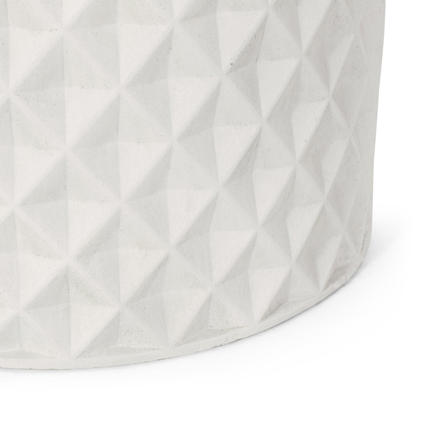 White concrete planter with geometric faceted diamond pattern texture