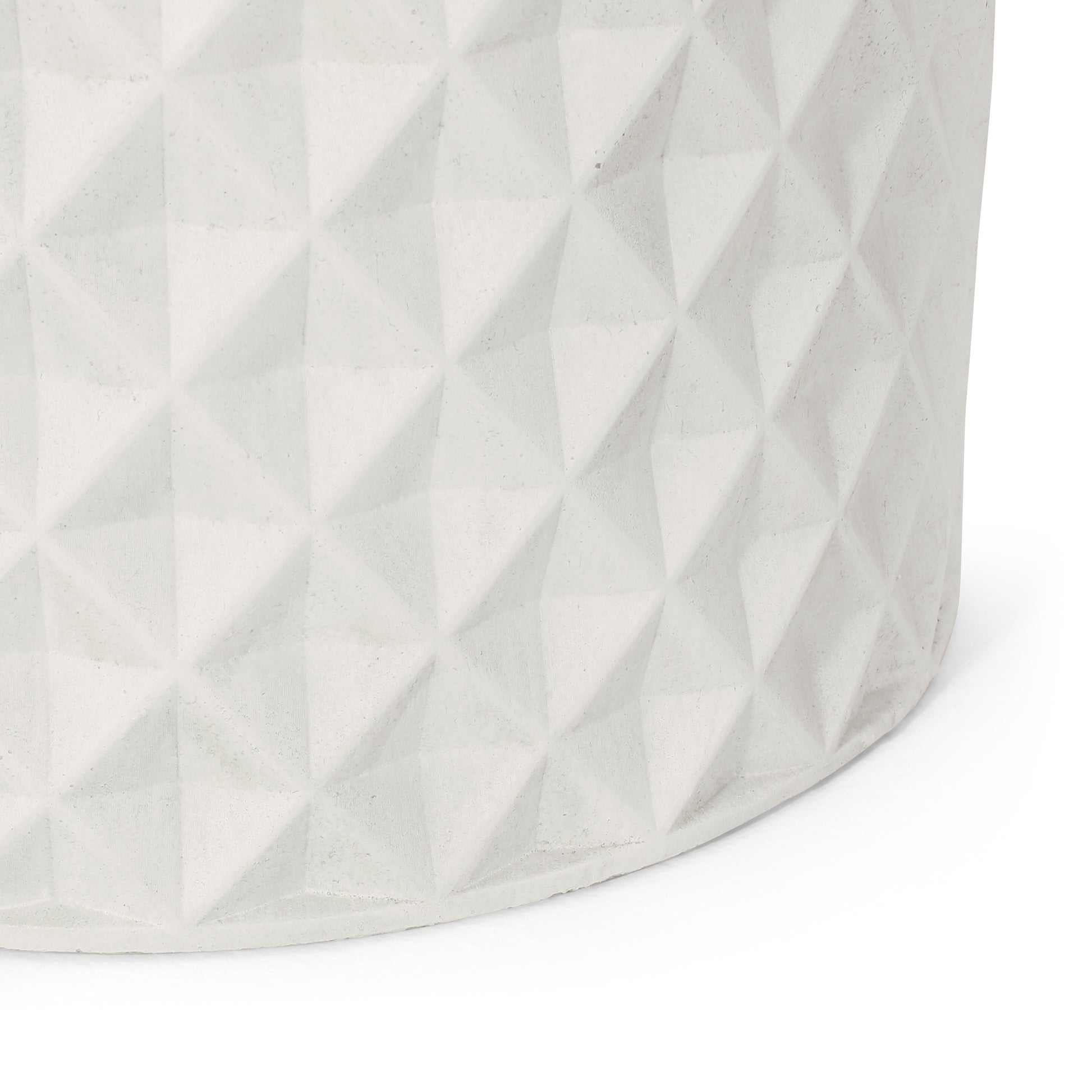White concrete planter with geometric faceted diamond pattern texture