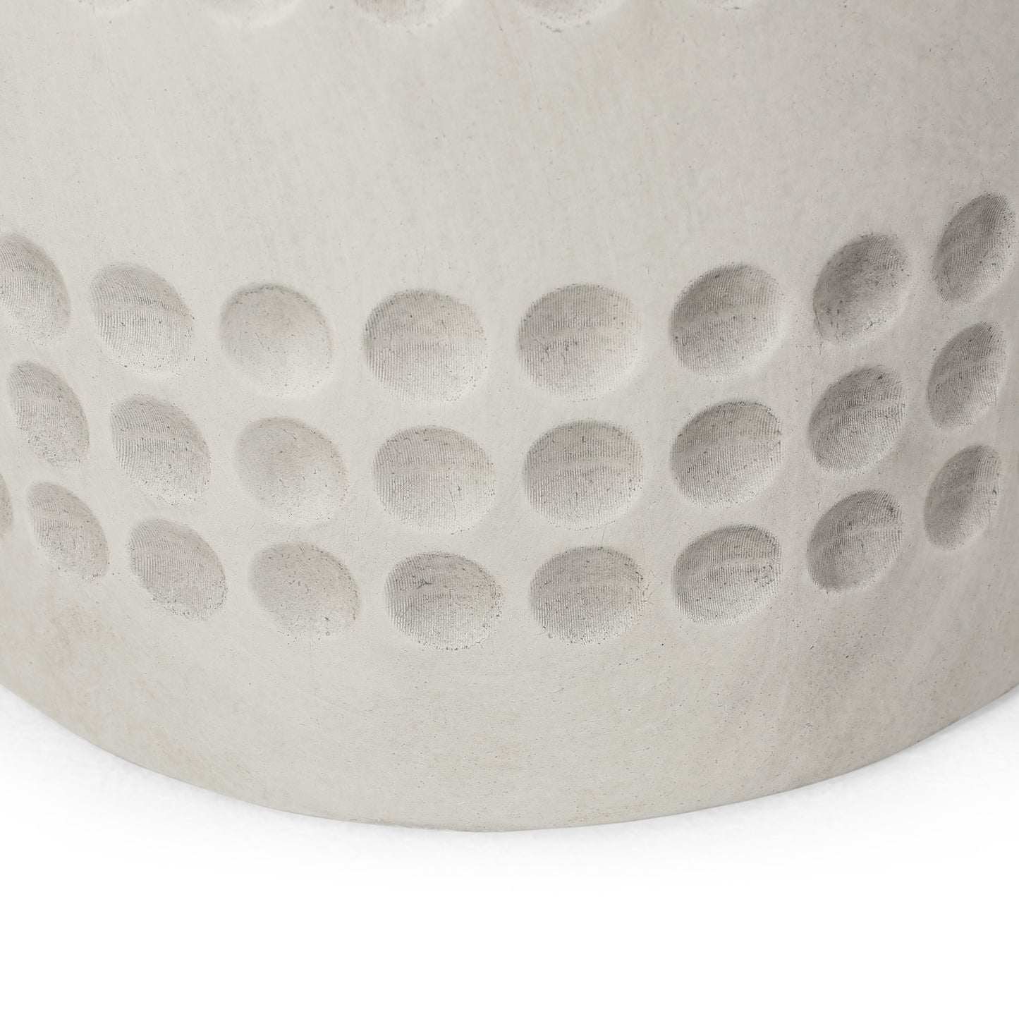 Textured grey concrete pot with subtle dimpled pattern modern minimalist design