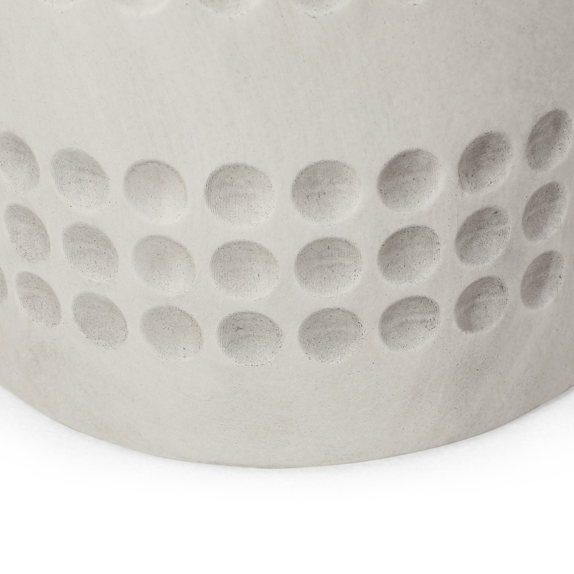 Textured grey concrete pot with subtle dimpled pattern modern minimalist design