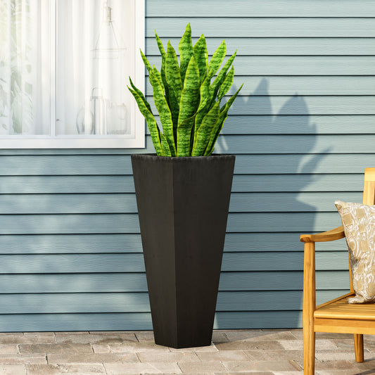 Tall black tapered planter with snake plant on patio