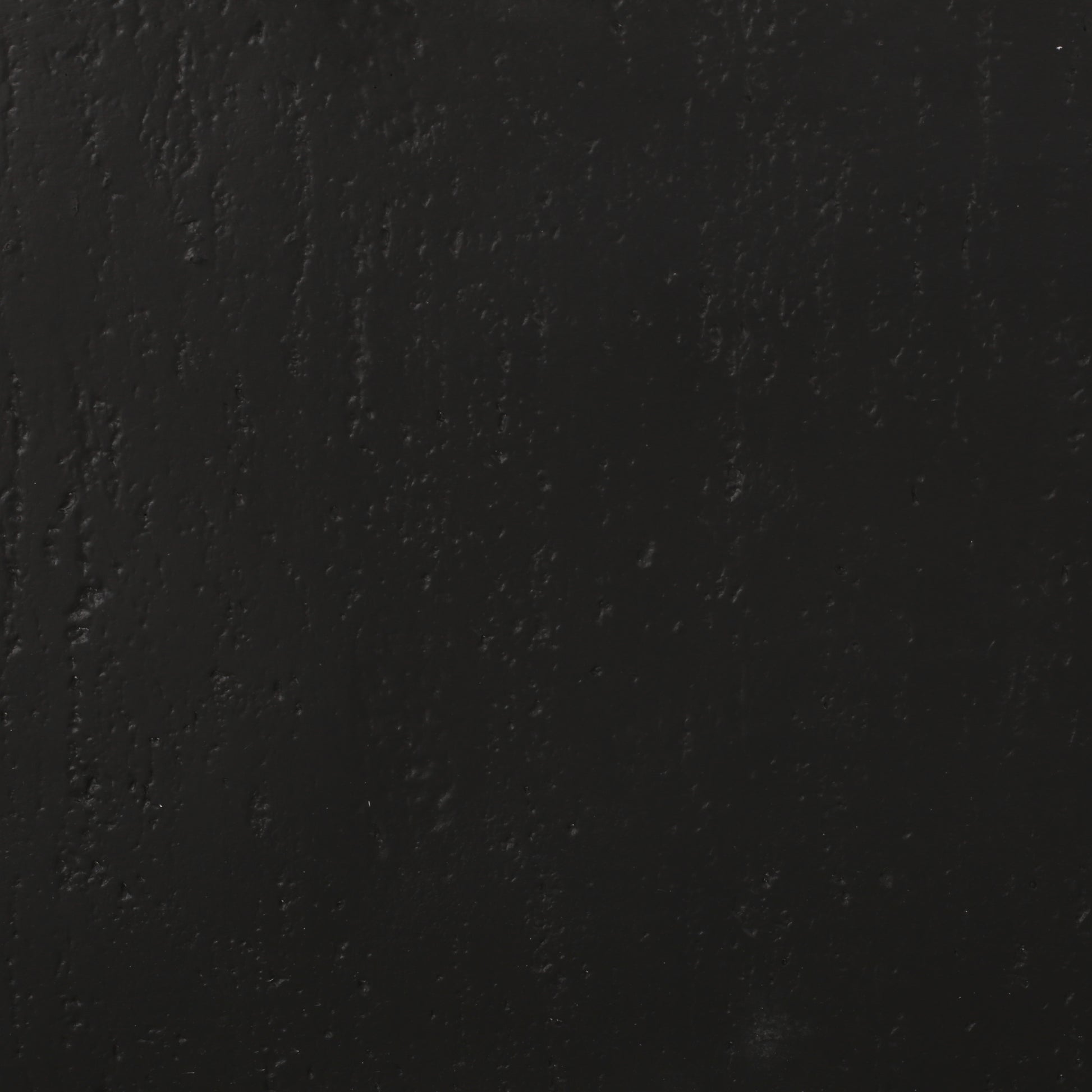 Textured black wall paint with a matte finish ideal for modern interiors