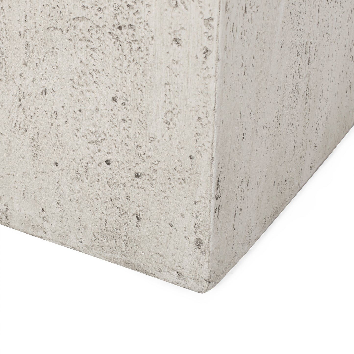 Textured concrete planter with a light gray weathered finish