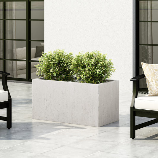 Modern rectangular concrete planter with lush green foliage perfect for patio decor