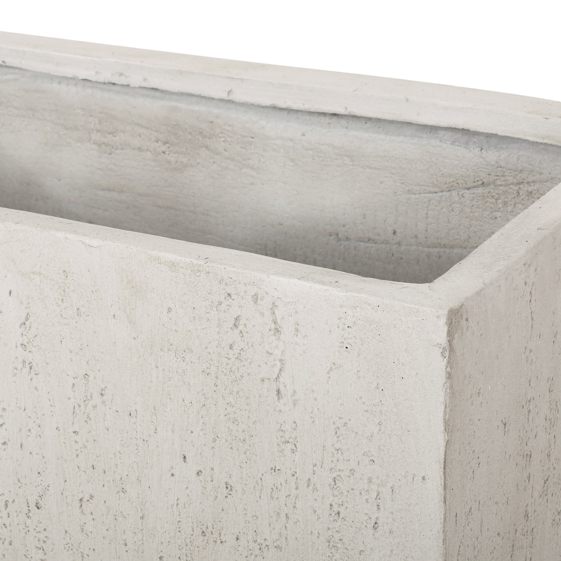 Light grey concrete rectangular planter with a textured finish