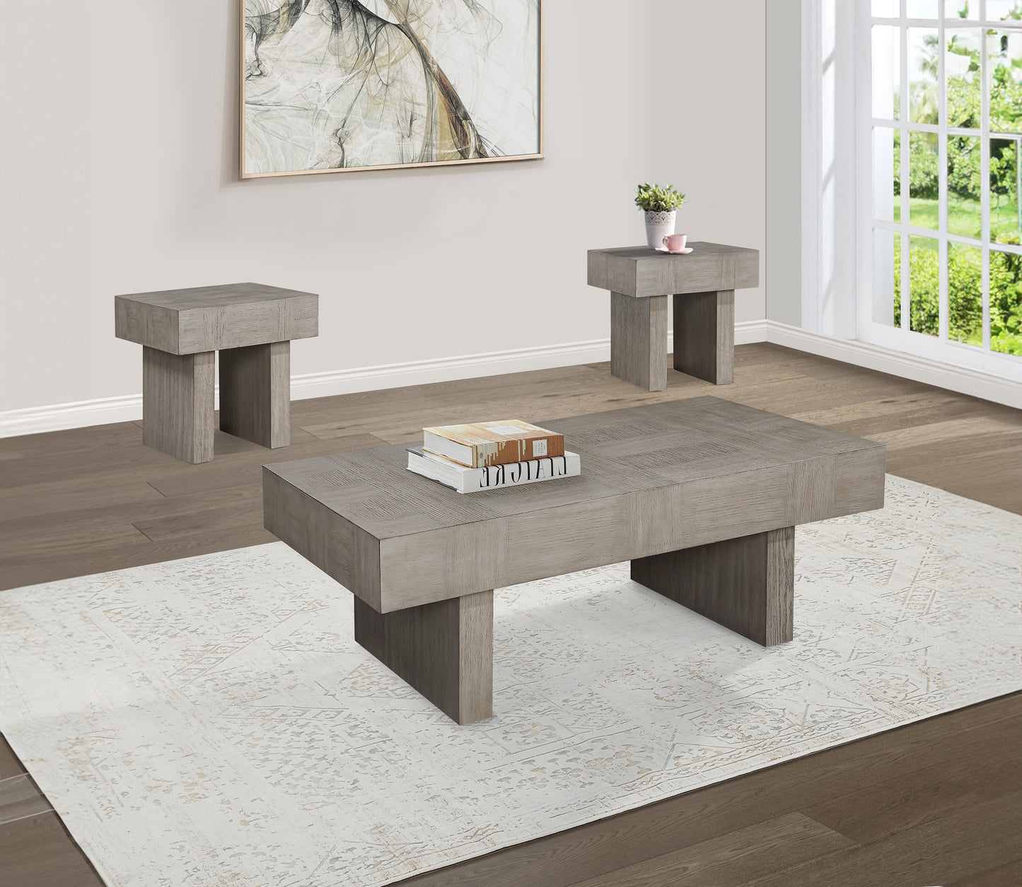 Modern grey wood coffee table with subtle textured surface set on a patterned rug