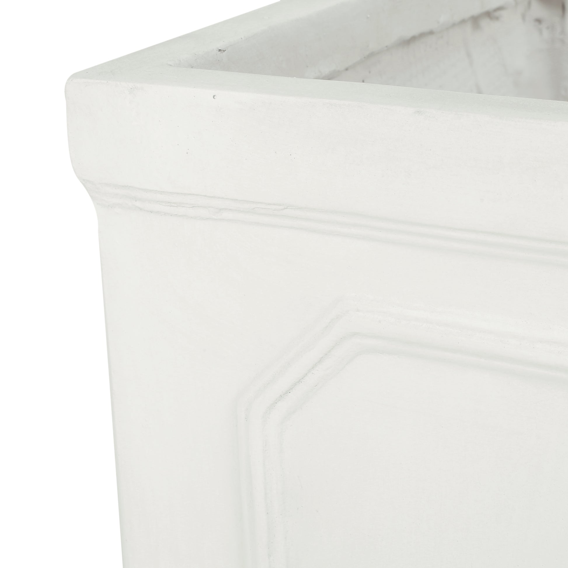 White concrete planter with subtle paneling detail