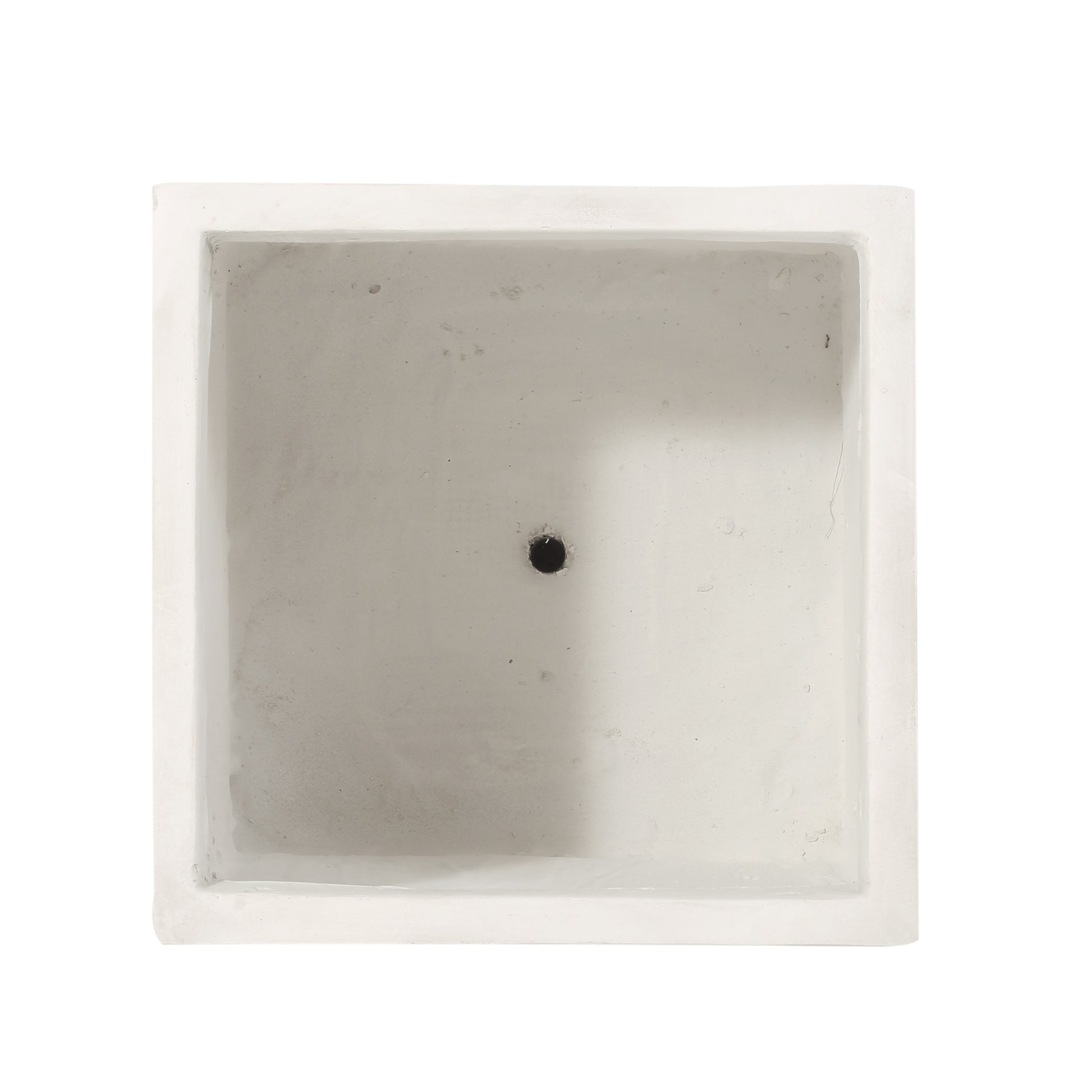 Minimalist white square concrete planter with drainage hole