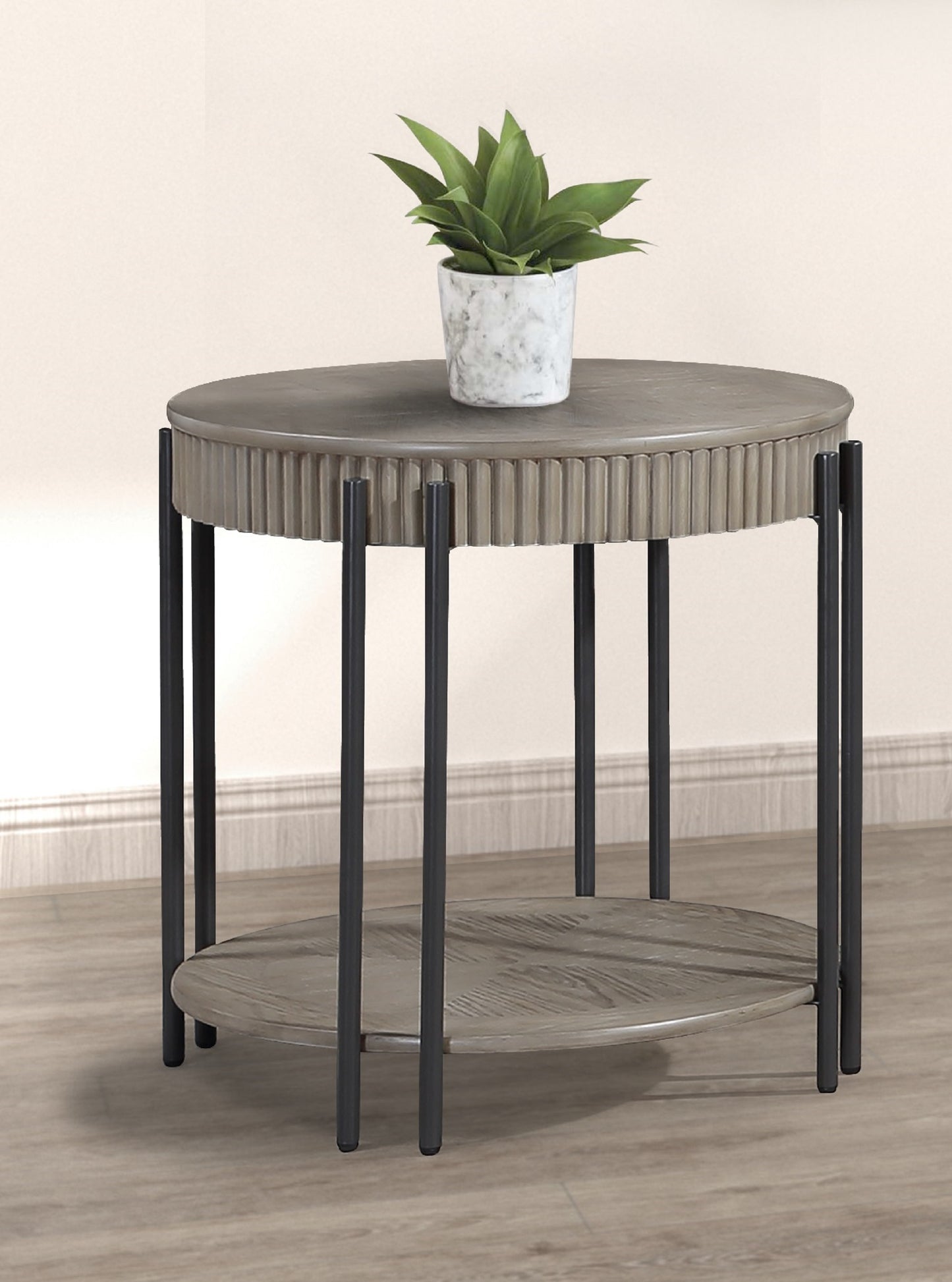 Round gray wood accent table with fluted detail and black metal legs
