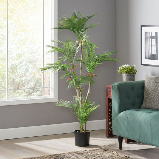 Tall artificial Areca palm with lush green fronds in a black planter