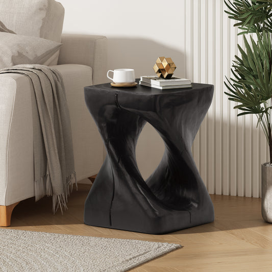 Black twisted resin accent table with smooth finish perfect for modern living rooms