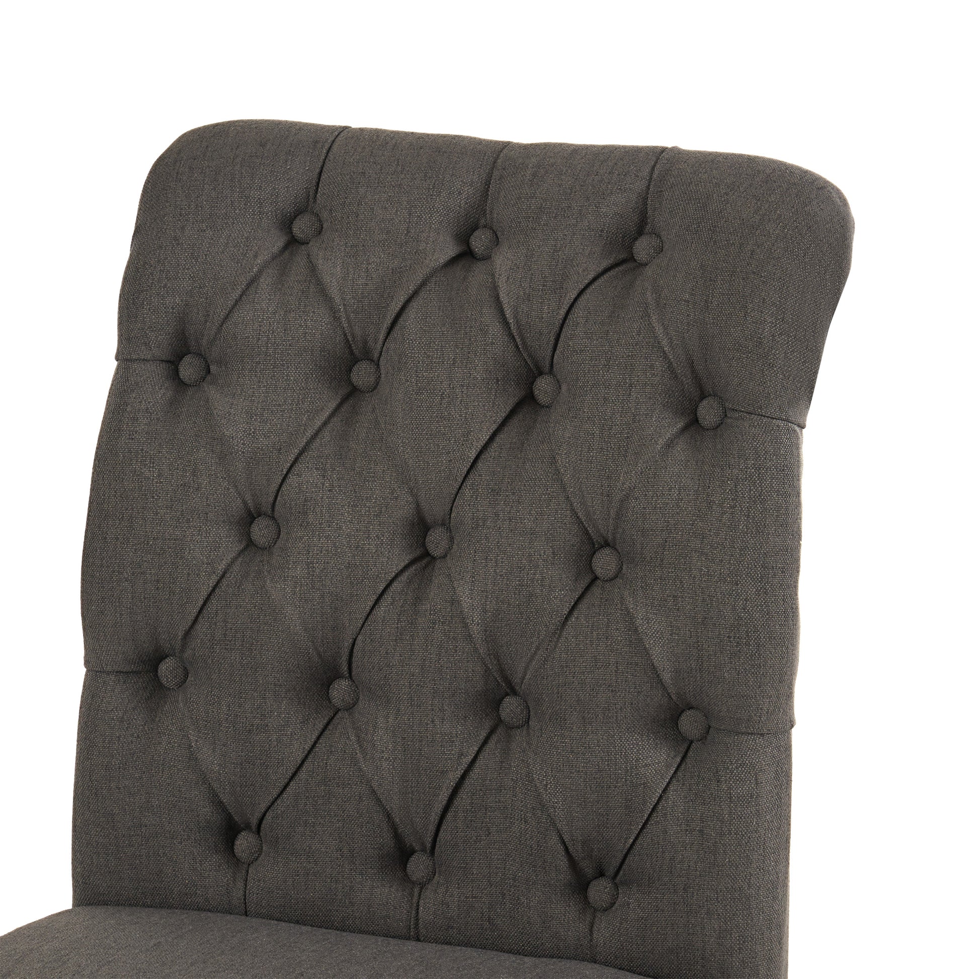 Charcoal grey fabric dining chair with diamond tufting and button details