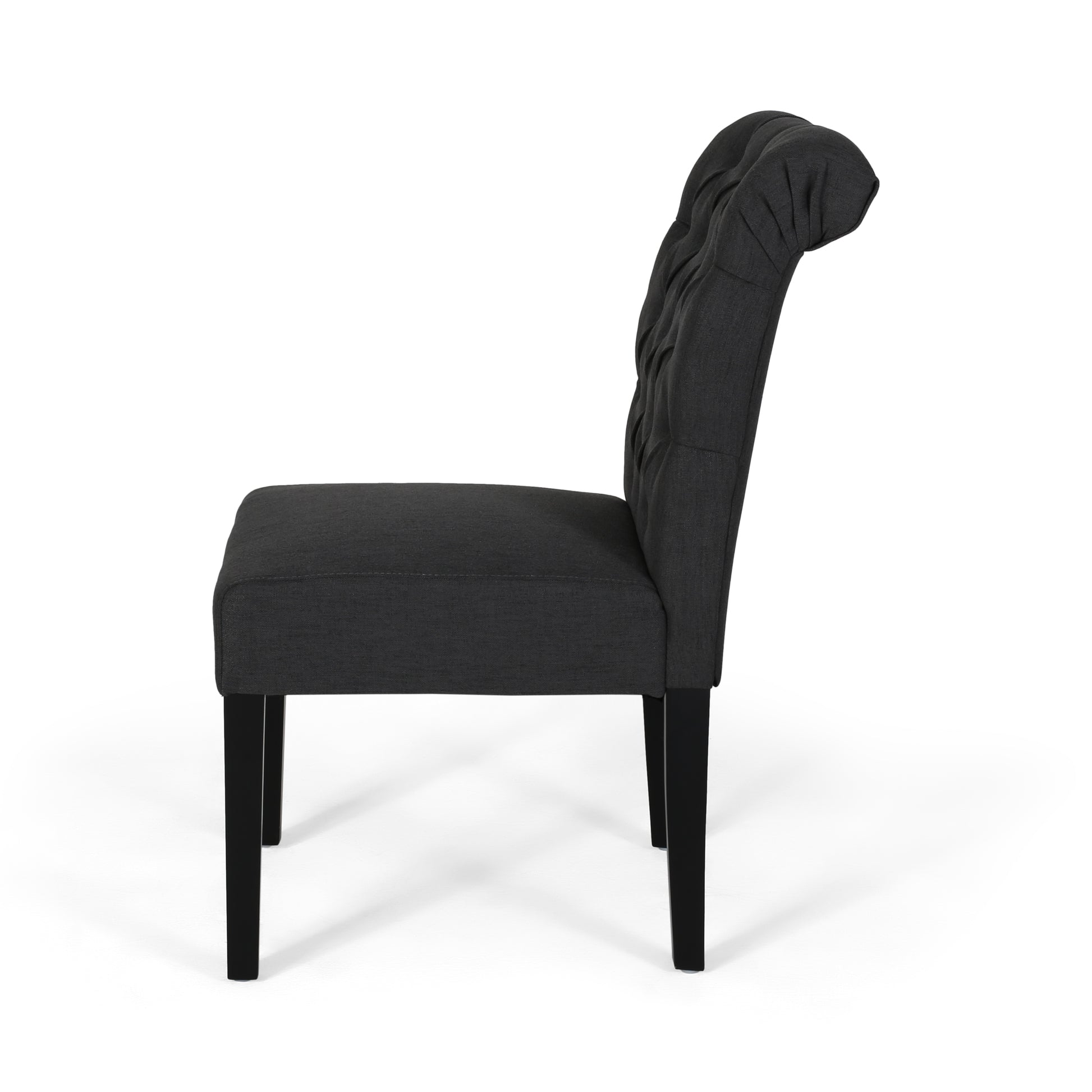 Dark grey fabric dining chair with tufted back and black wooden legs