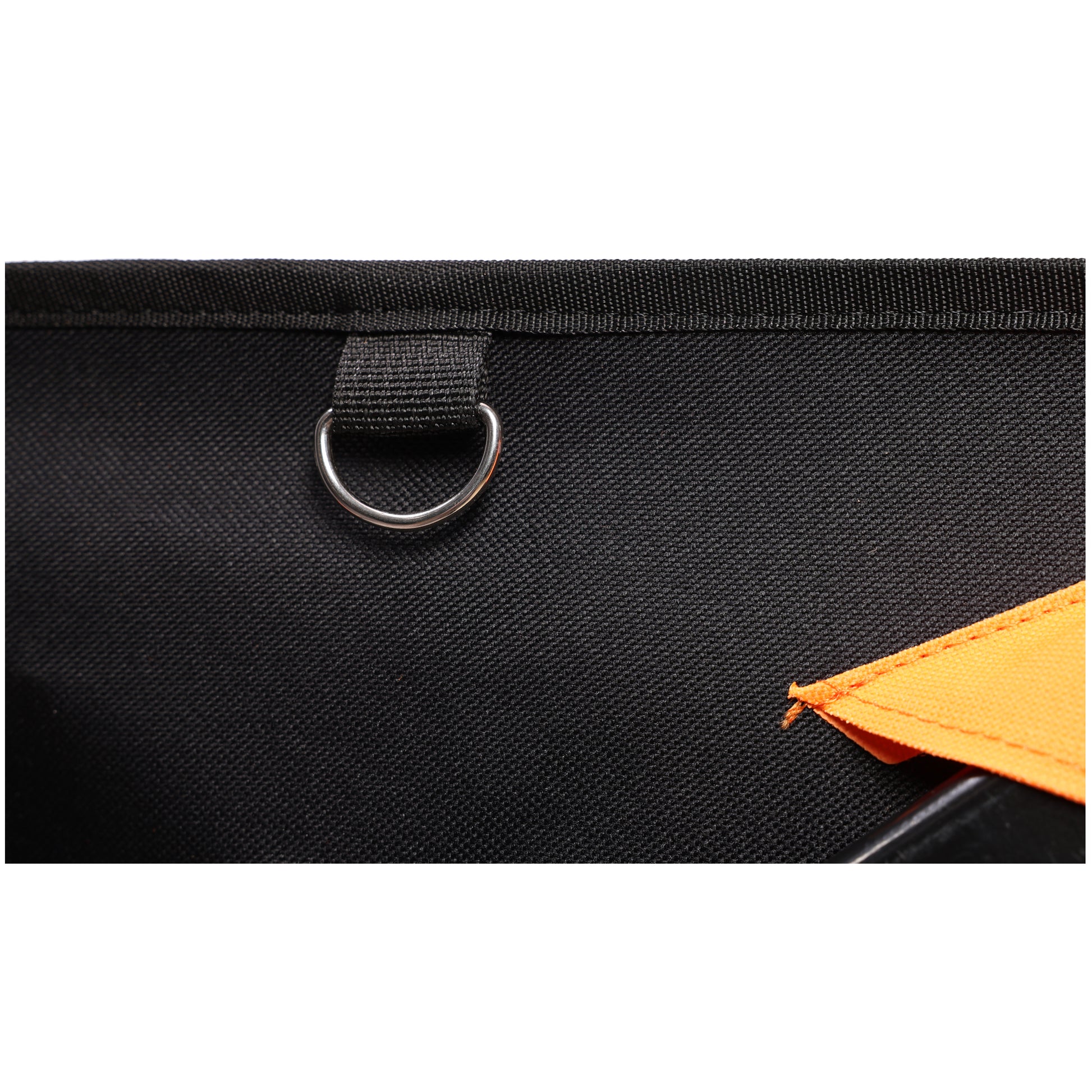 Closeup of black durable fabric on a bag with a silver Dring detail