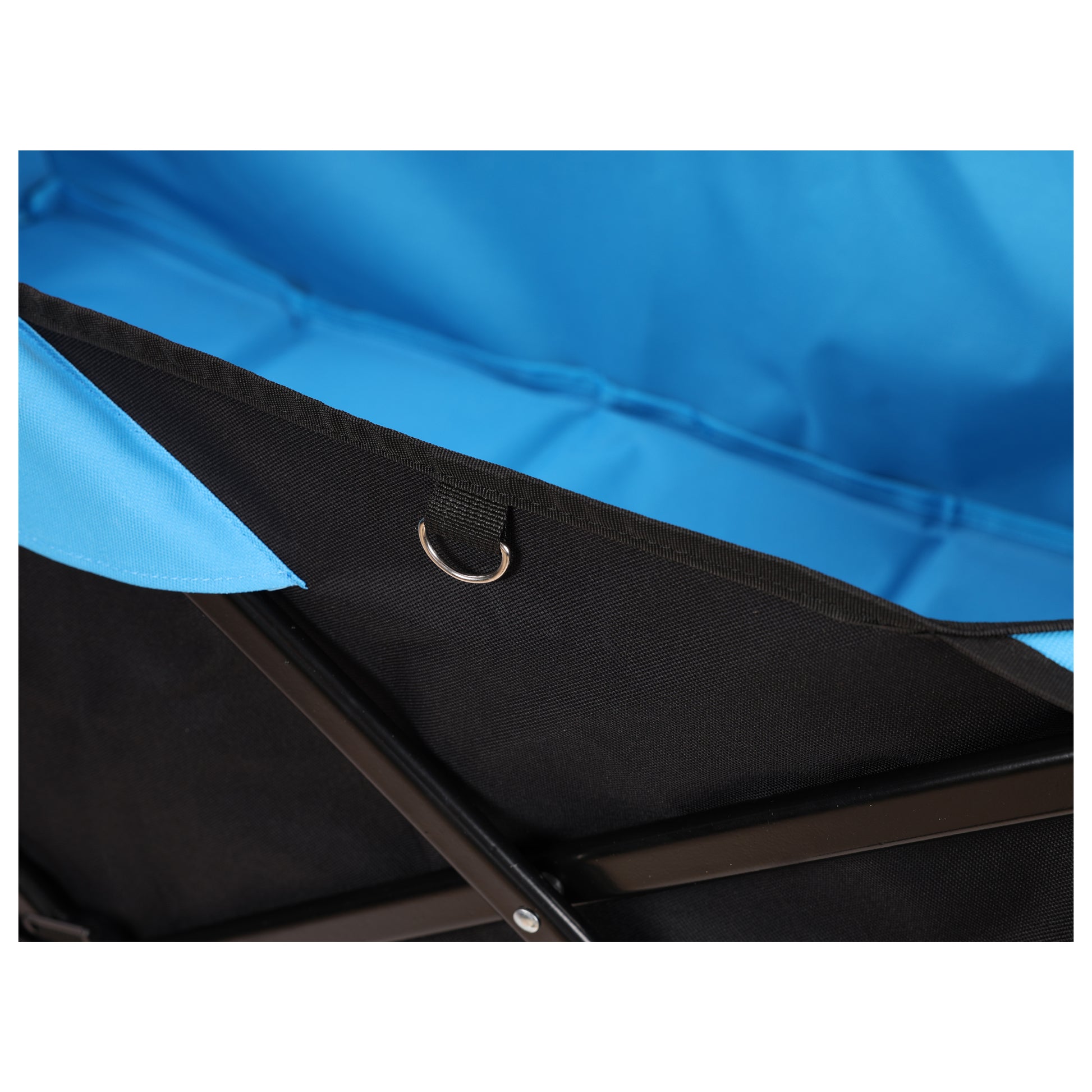 Closeup of blue canvas fabric on a black metal frame showing a Dring for attachment