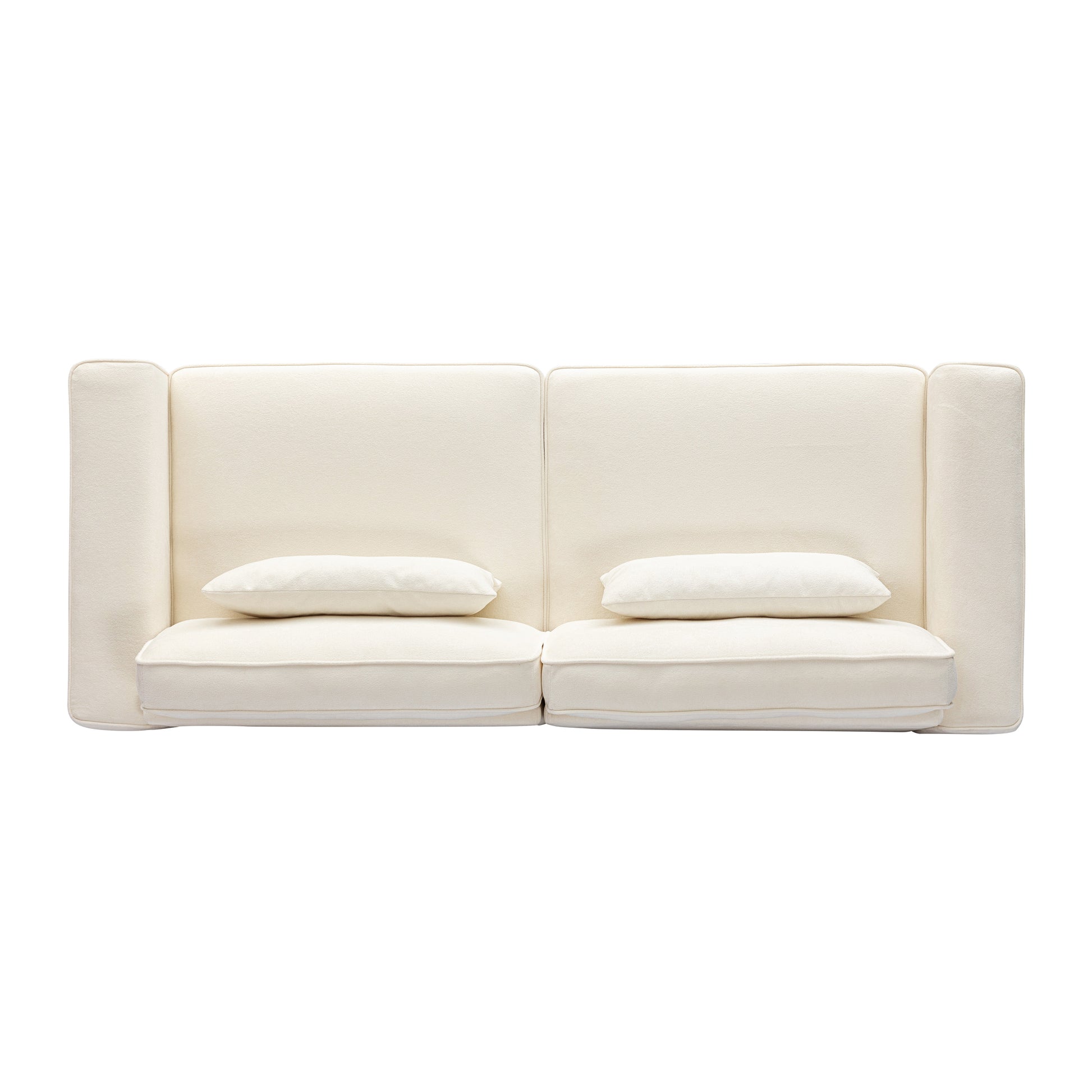 Minimalist cream sofa with two plush throw pillows modern living room furniture