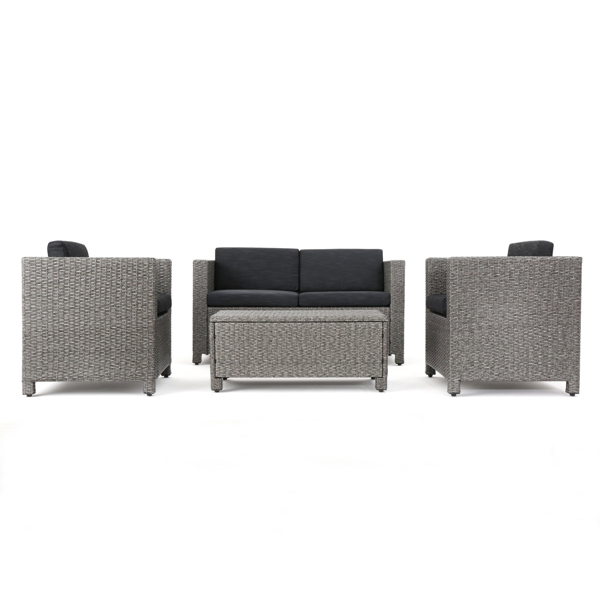 Grey rattan sectional outdoor sofa set with charcoal cushions and matching coffee table