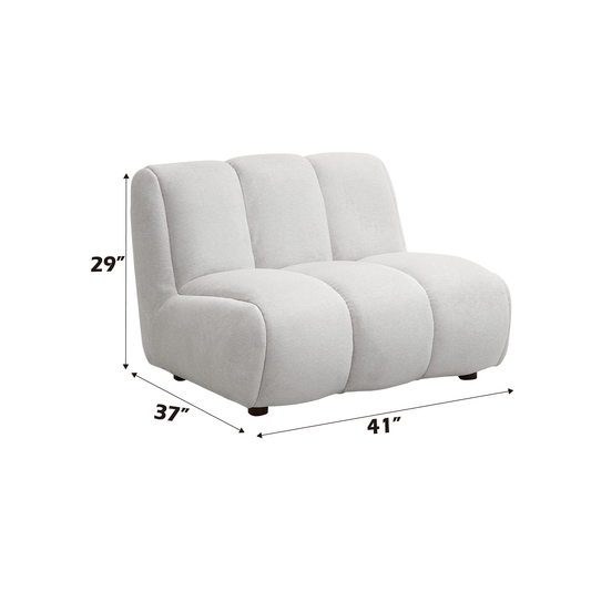 Light grey upholstered armless accent chair with padded horizontal segments
