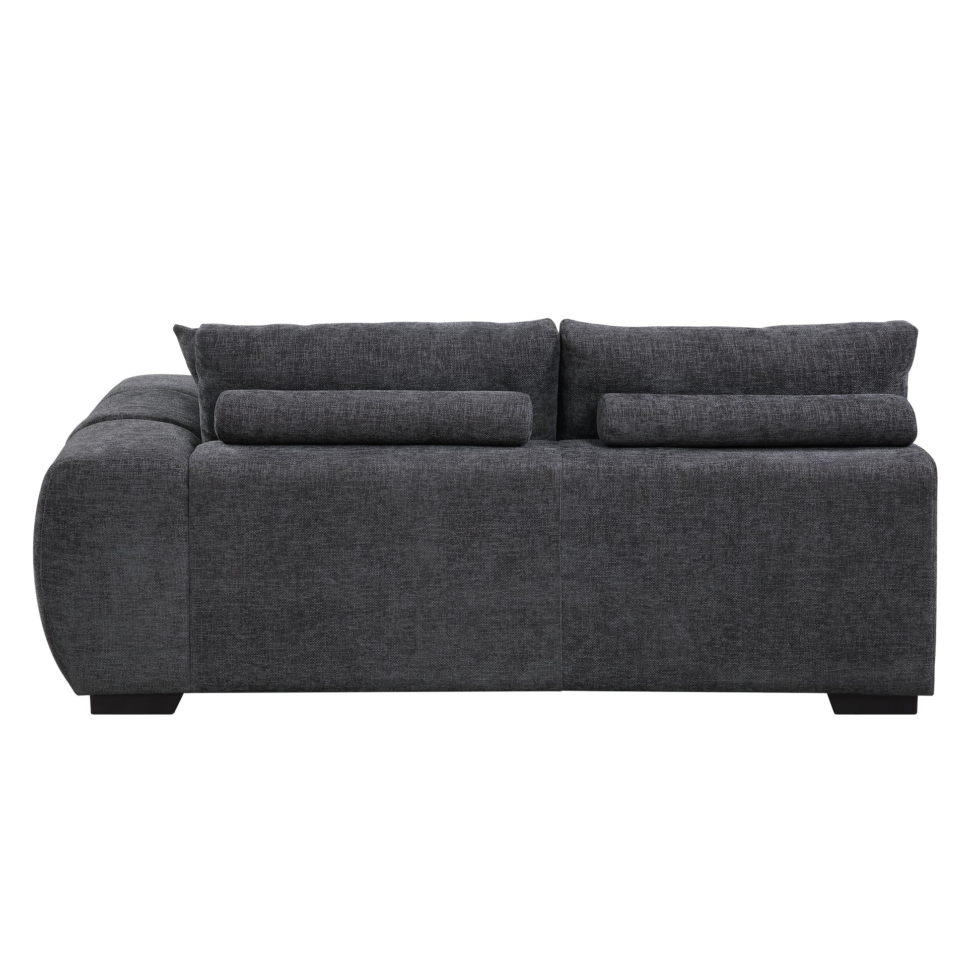 Charcoal grey fabric sectional sofa with plush cushions and bolster pillows