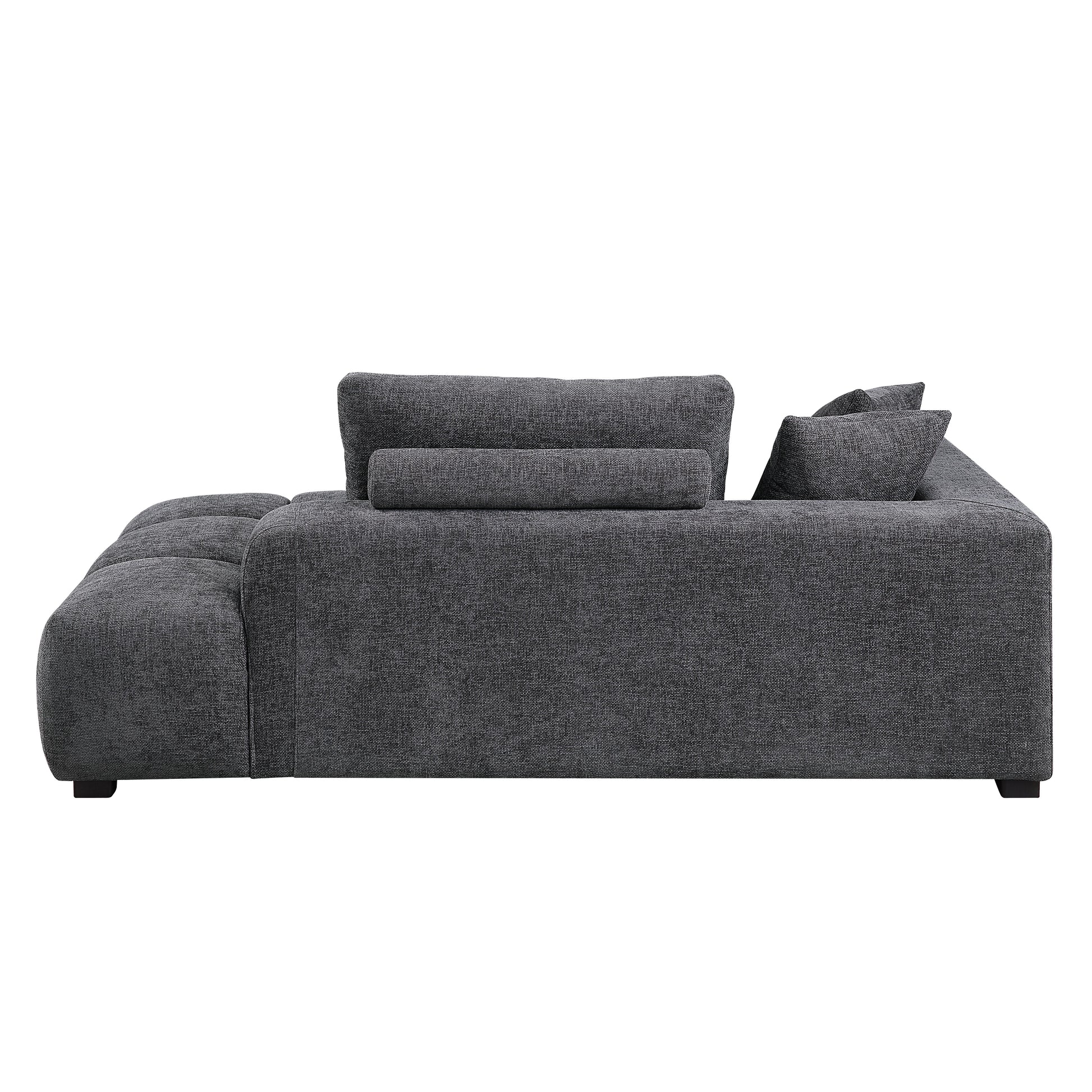 Dark gray fabric sectional sofa with plush back and accent pillows for a modern living room