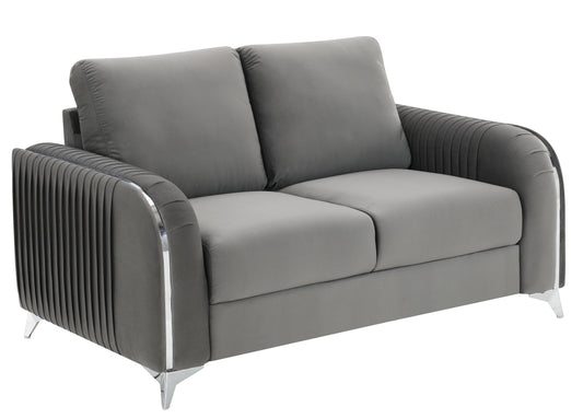 Plush grey velvet loveseat with pleated arms and chrome legs