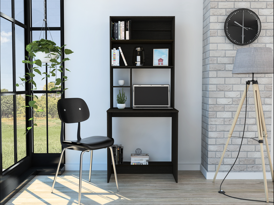 Black modern computer desk with shelves featuring a laptop and decor