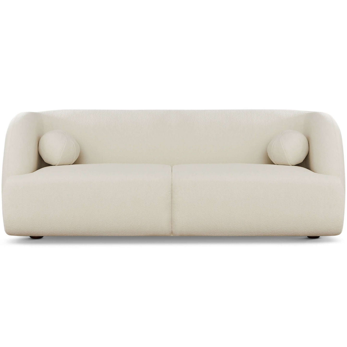 Cream boucle fabric sofa with rounded arms and two circular accent pillows