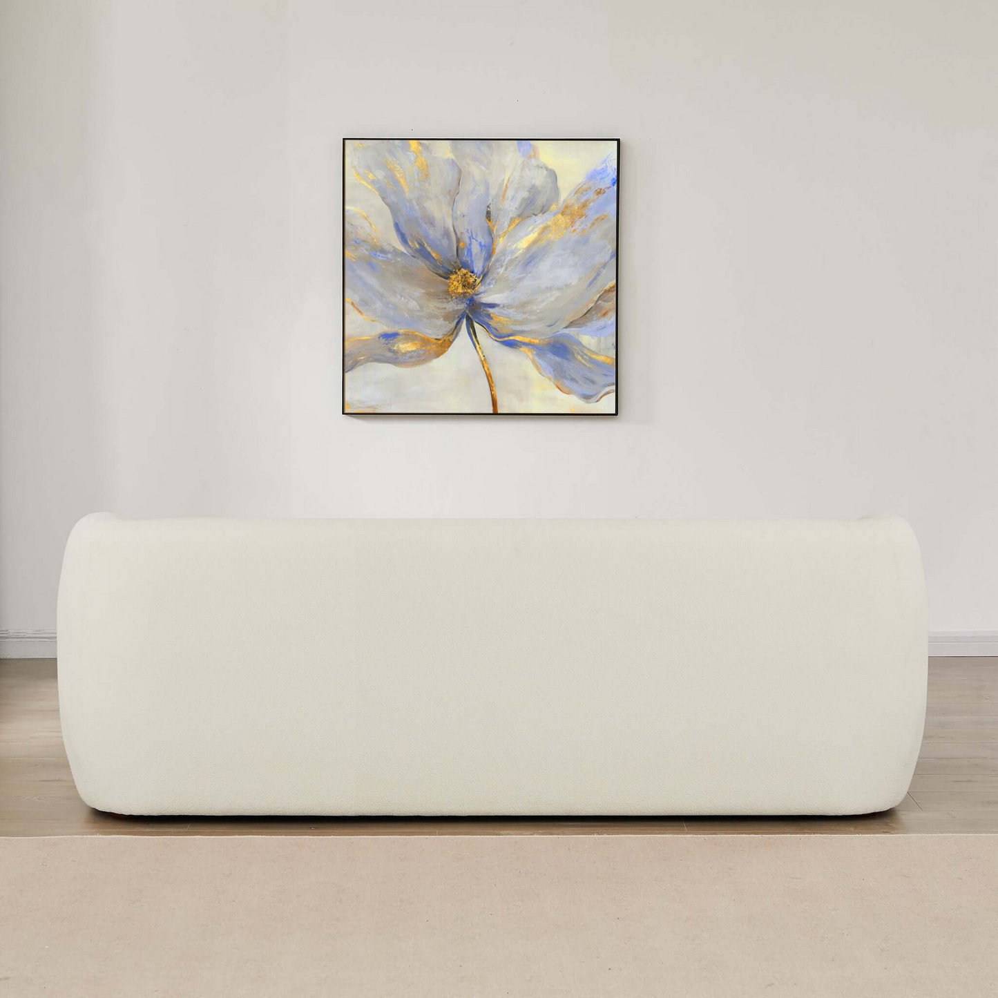 Cream boucle sofa with plush texture offering modern comfort and style for living spaces
