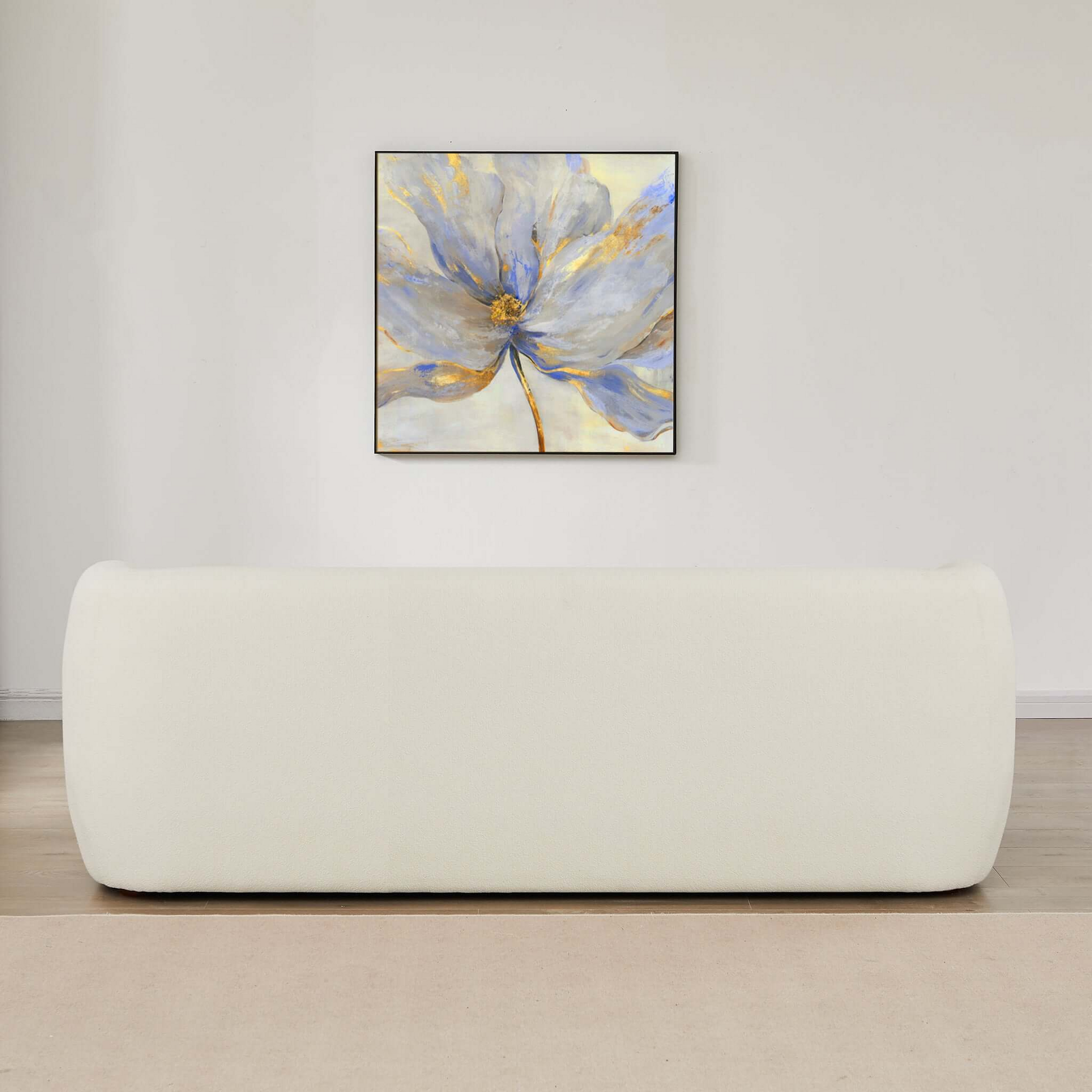 Cream boucle sofa with plush texture offering modern comfort and style for living spaces