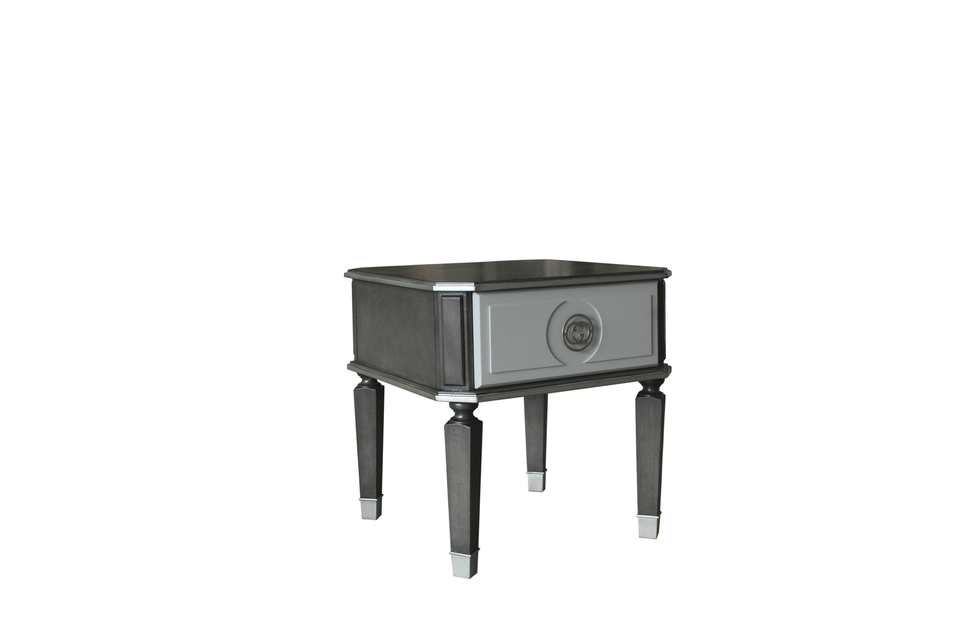 Dark gray modern accent table with a silver drawer front and metal leg caps