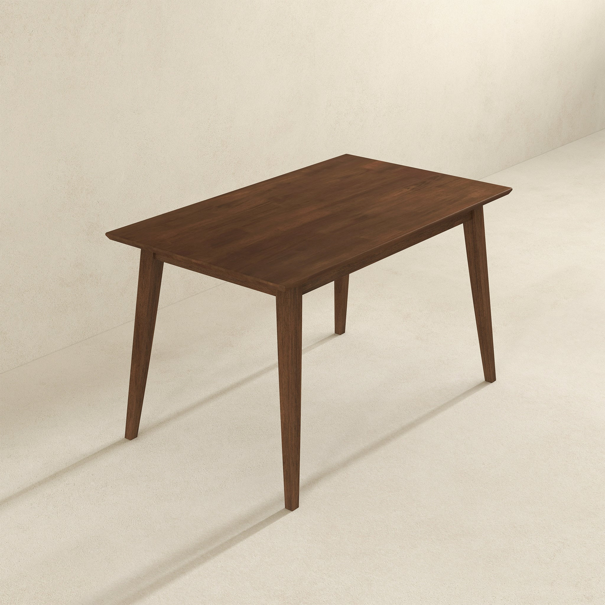Dark wood dining table with tapered legs minimalist design for modern homes