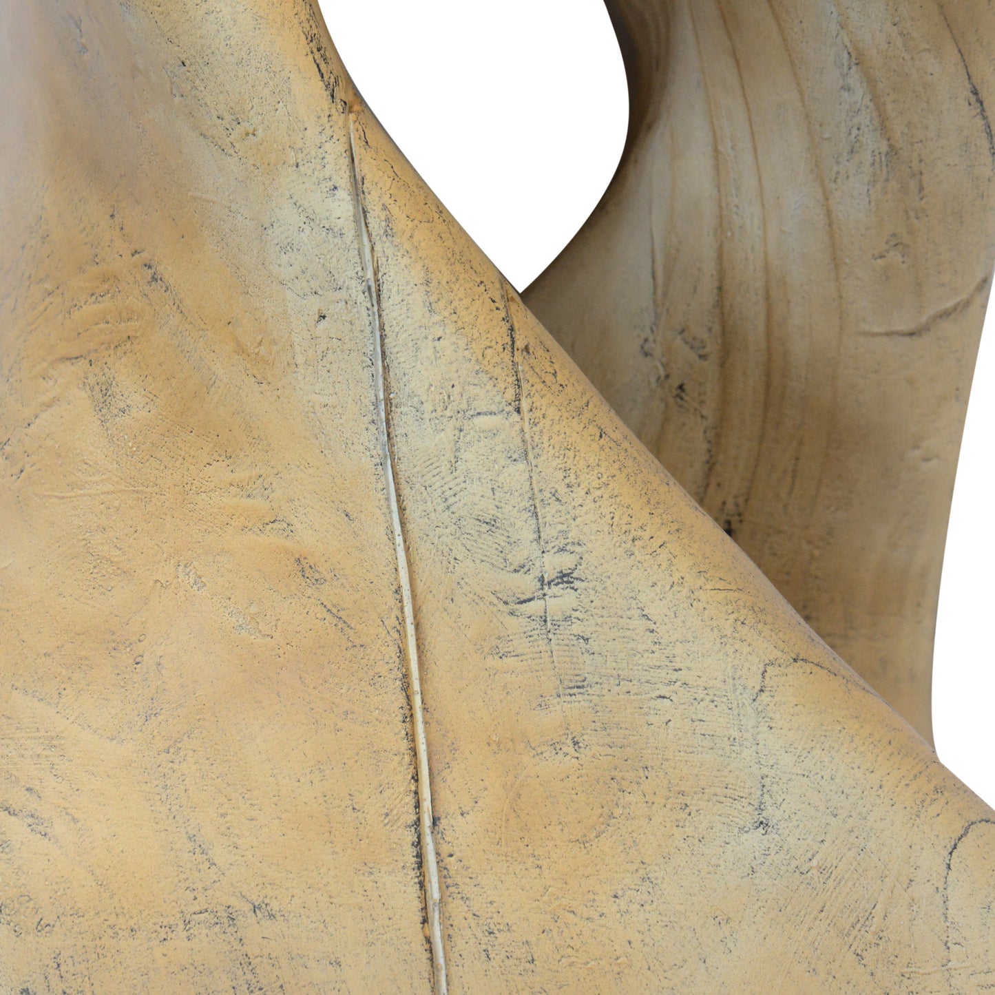 Abstract sculpture made of light brown wood with visible grain and dark accents organic modern style