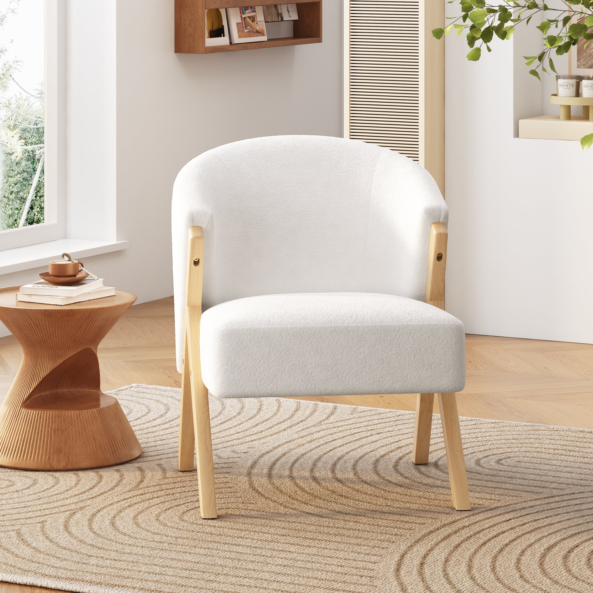 White boucle accent chair with light wood legs perfect for living rooms
