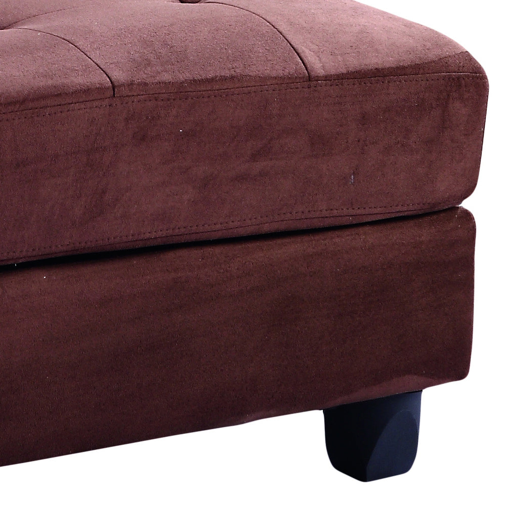 Deep brown tufted suede ottoman with clean stitching and a short black leg
