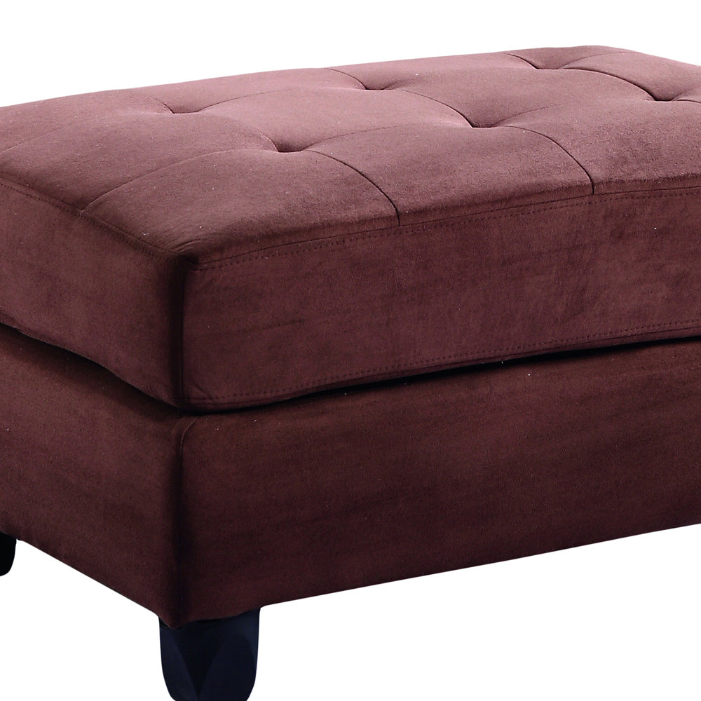 Tufted upholstered ottoman in deep burgundy perfect as a footrest or extra seating