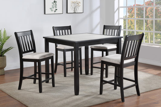 Dark wood bar table with beige upholstered stools perfect for a kitchen breakfast nook