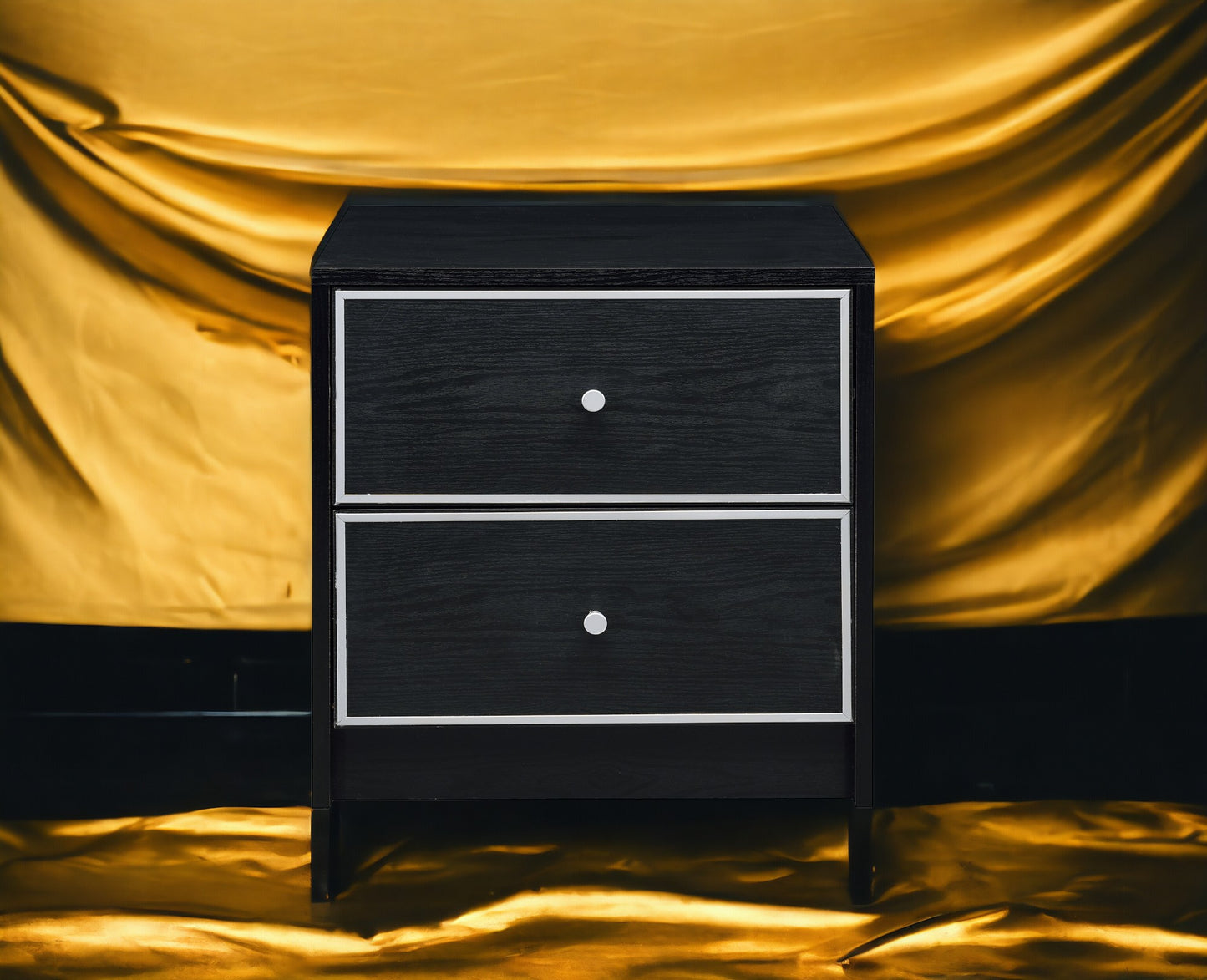 Black twodrawer nightstand with silver knobs and white trim