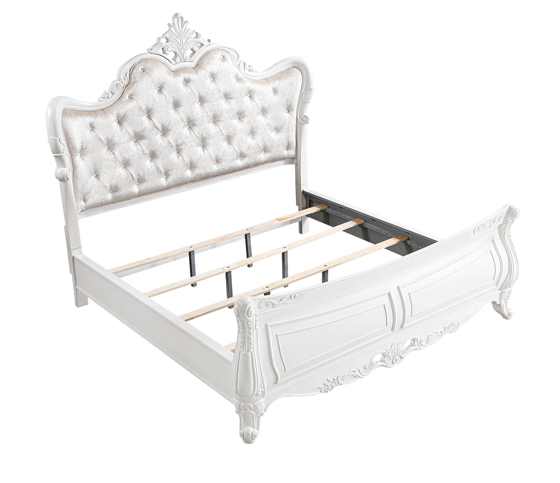 White ornate upholstered bed frame with tufted headboard and decorative molding
